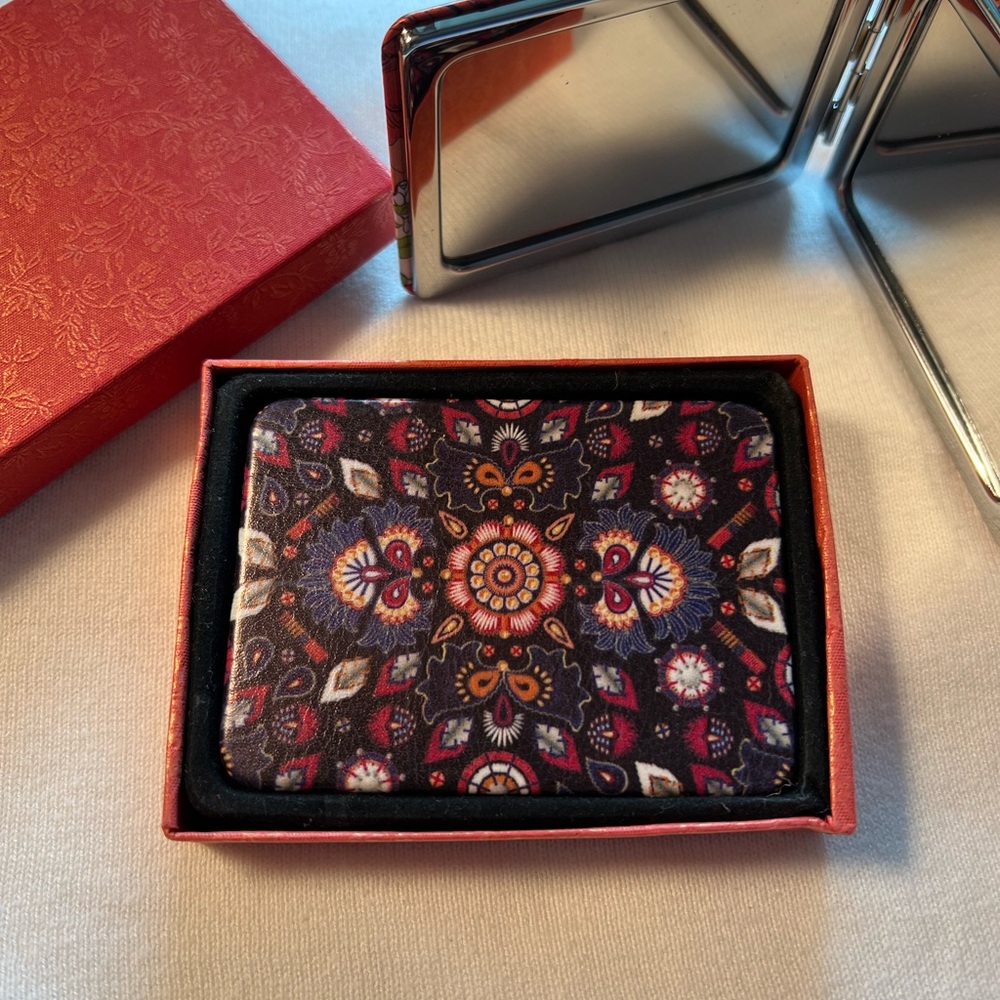 Elegant purse mirror. New